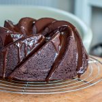 chocolate bundt cake with chocolate ganache on wire rack