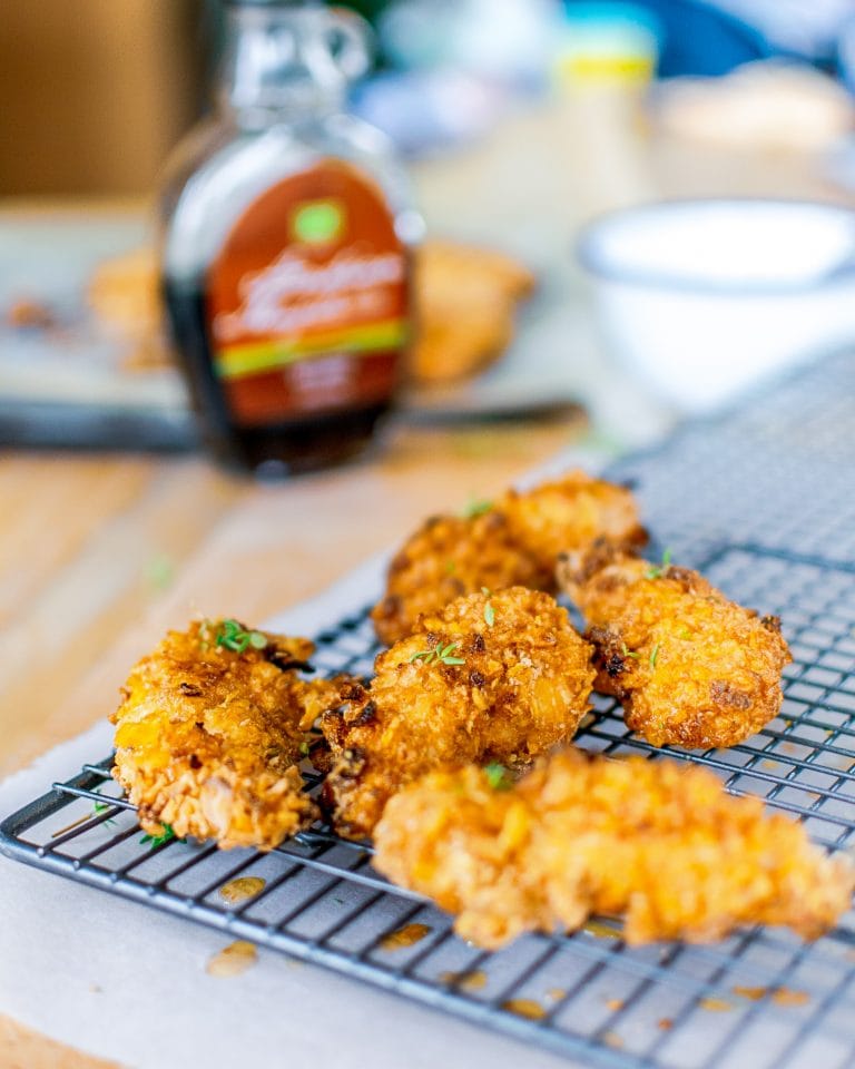 Super easy chicken strips that are healthy for kids and quick to make. This ridiculously tasty baked chicken strips recipe is worth switching from store bought. #chicken #familyfood #ovenfried #chickenstrips