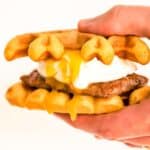 breakfast sandwich waffle with egg and sausage