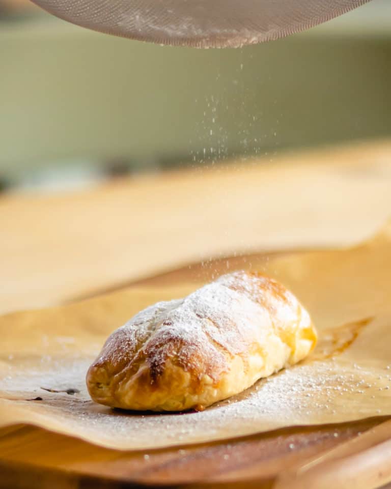 baked mars bar with icing sugar dust