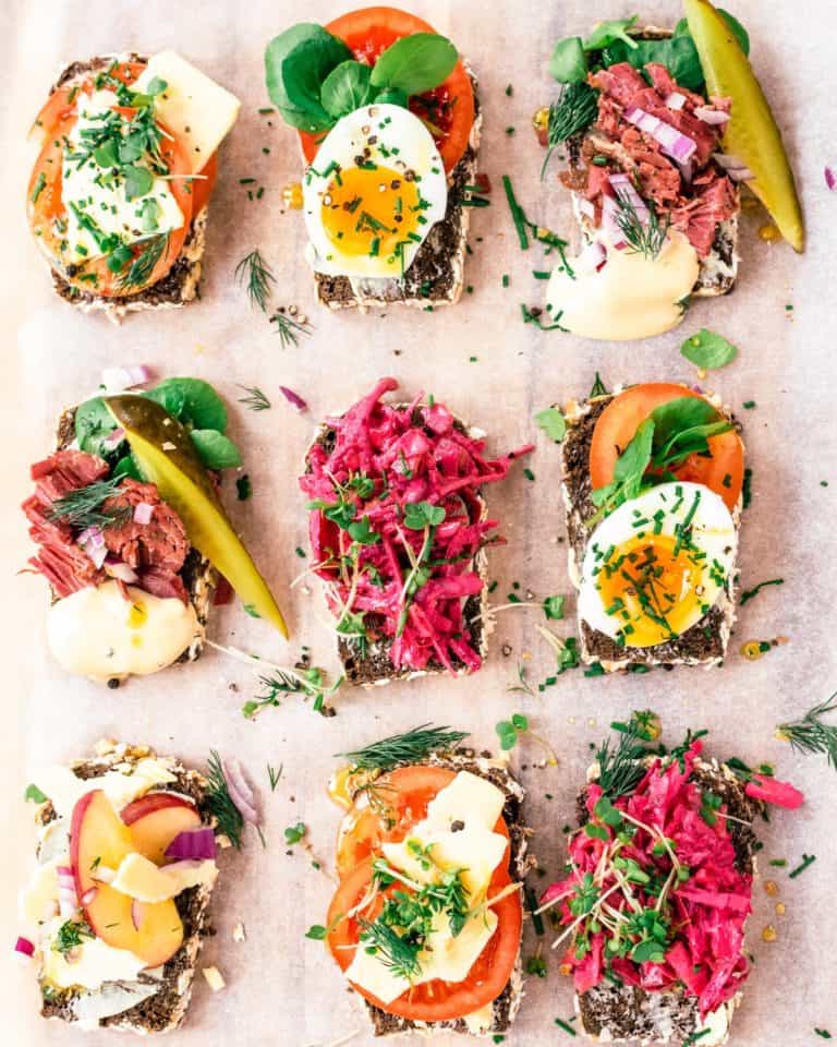 variety of smorrebrod on serving board